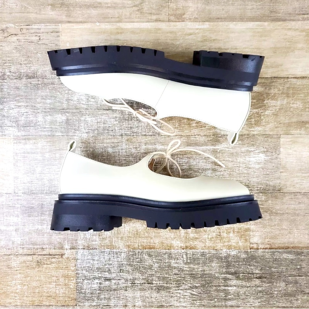 Elegant Cream Loafers with Black Soles